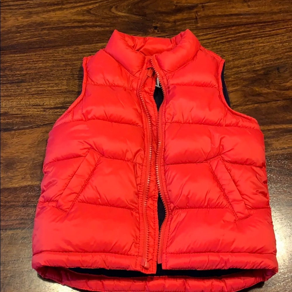 Old Navy Red puffer vest.
